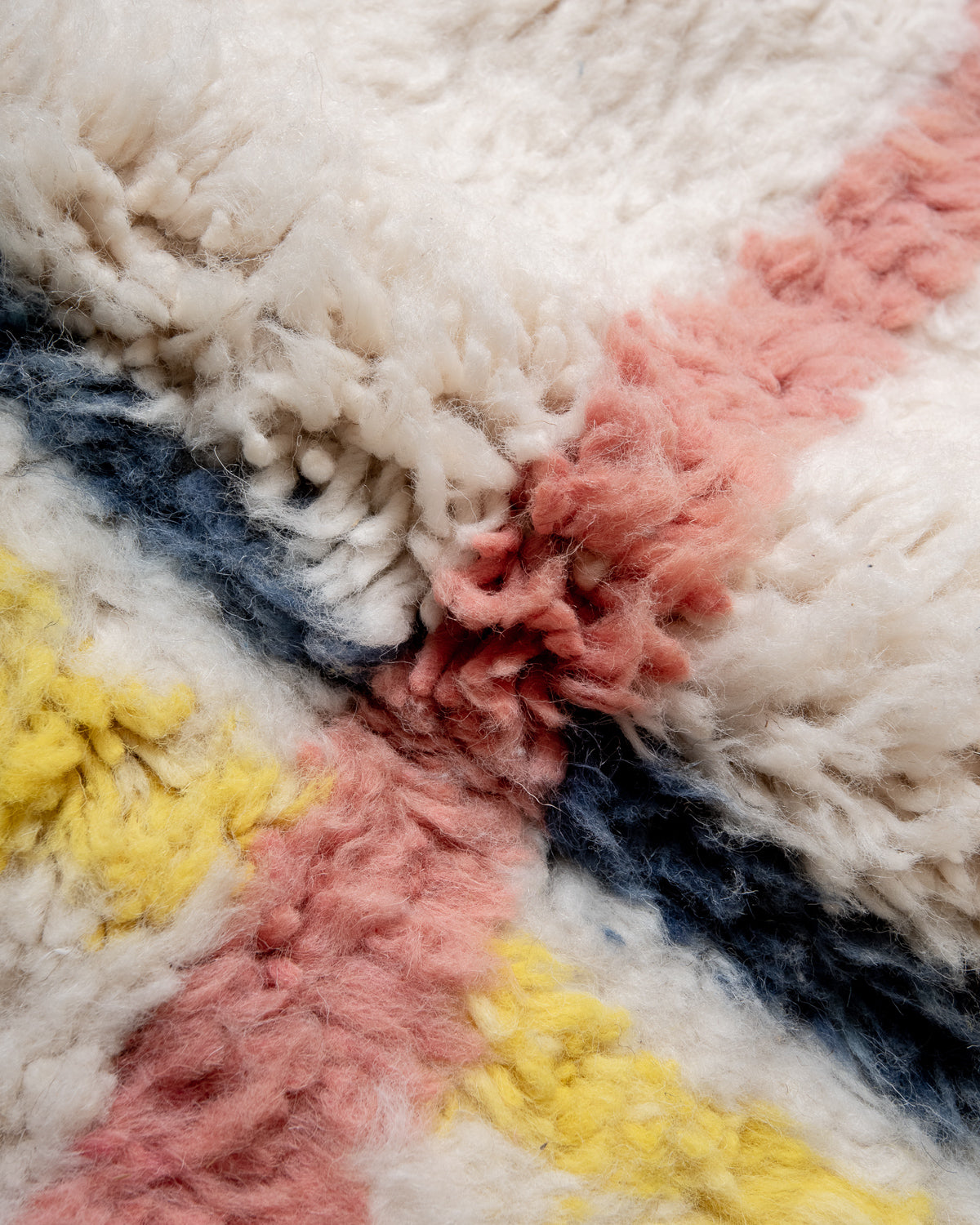 Modern, designer, handcrafted Berber rug from Morocco. Beniourain carpet with beautiful colours and patterns and fluffy wool texture.